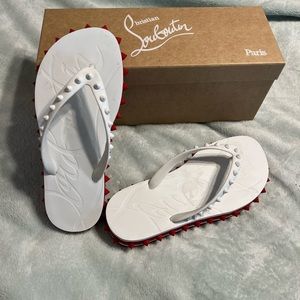 Christian Louboutin Loubi Flip Flop. Perfect condition -wore twice on the boat.